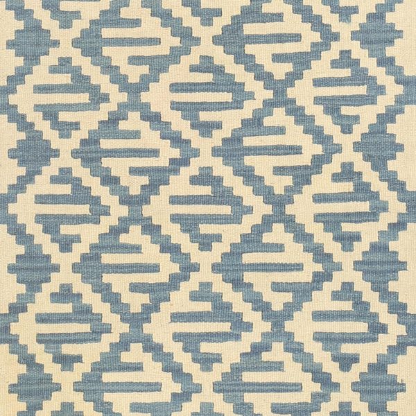 Nahaufnahme: ineinander greifende Rauten in Graublau und Creme