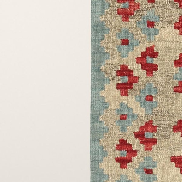 Seitliche Bordüre mit roten und blauen Motiven
