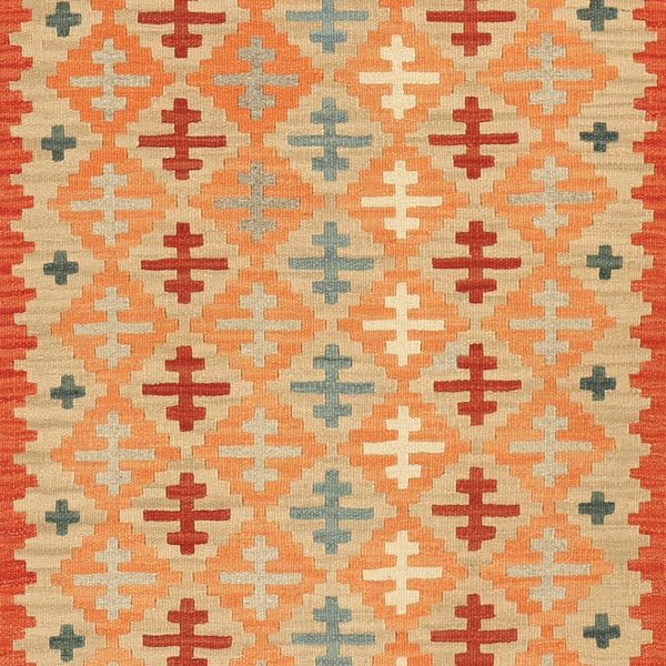 Nahaufnahme: Rauten in Orange und Beige mit kleinen Kreuzen in Creme und Grau