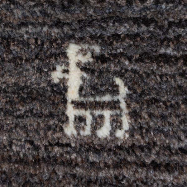 Nahaufnahme des eingewebten hellen Tiers